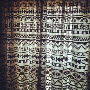 View from my bath, over-dyed blanket print curtains.