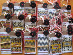 Card swing tags with leather button.