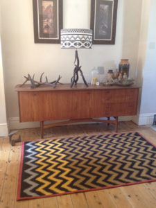 Zig Zagger' in red and wet sand. 4ft x 6ft.