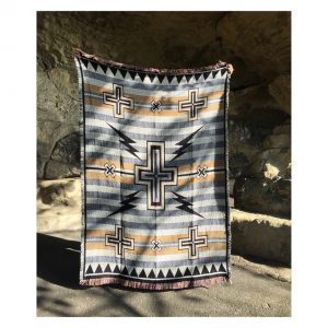 Tempest' throw in denim + buff shades.